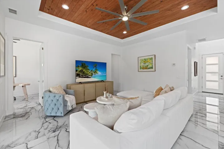 Living room with tray ceilings