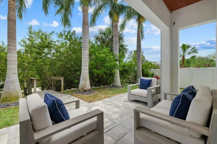 Covered lanai with steps to the dock