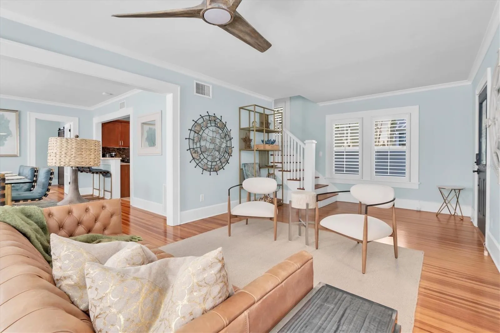 Living Room.  Staircase to 2nd Floor in back left. Dining room &amp; Kitchen to the immediate left.