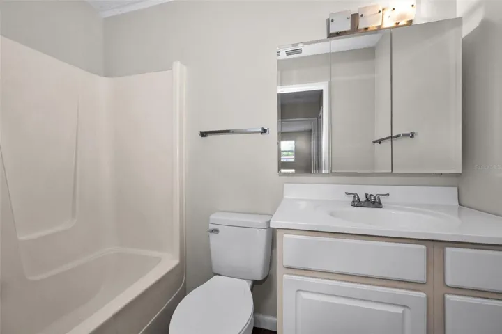 Guest bathroom with tub