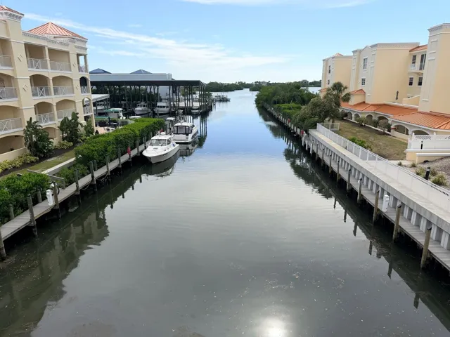 West facing marina and water views from this spacious Bellagio residence with included 37 foot wet slip