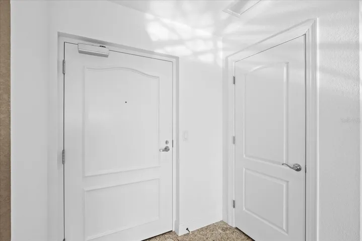 Private entrance off of elevator (entry on left, stairs on right)