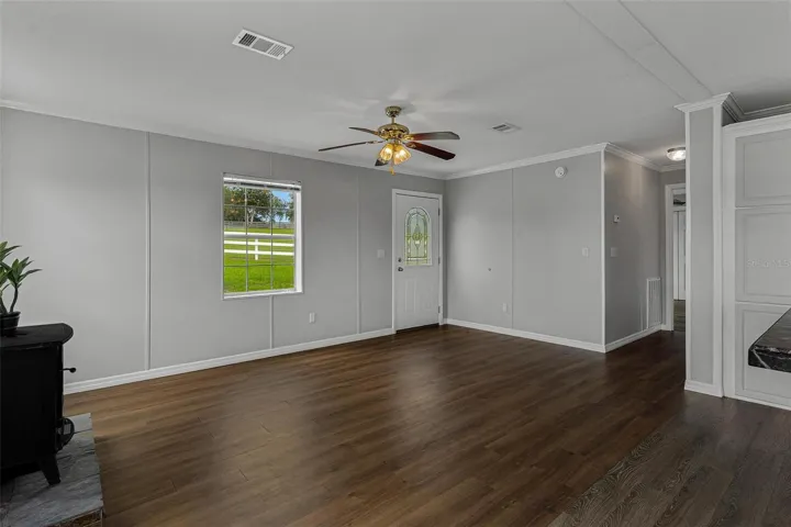 Living area ...love the wood look laminate flooring!