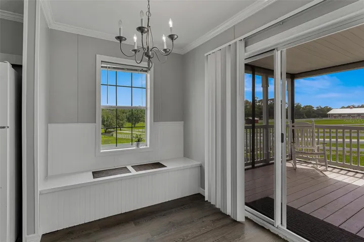 Dining area with Bench Seat lead to Screen porch.