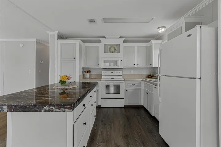 Refrigerator, Range and built in Microwave convey...