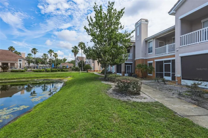 Front Entry Exterior with Pond View