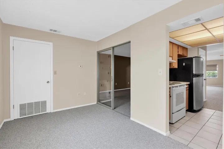 Florida room looking towards bedroom and kitchen