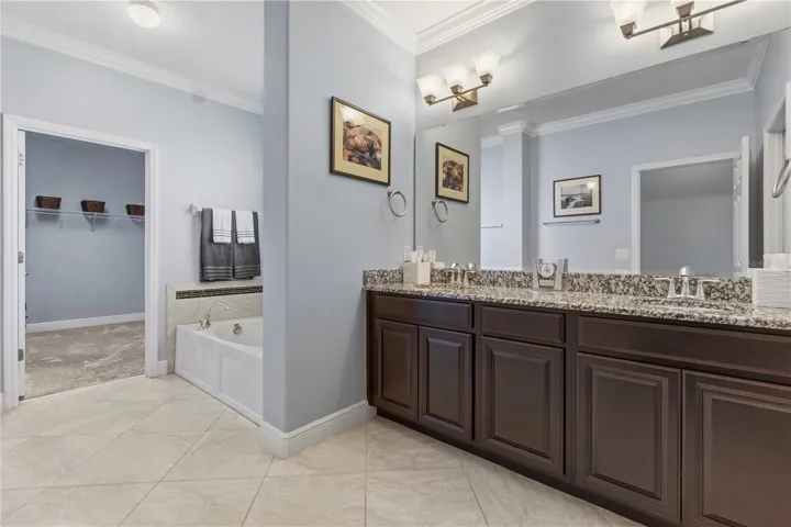 Primary Bath with Double Sinksand Closet View