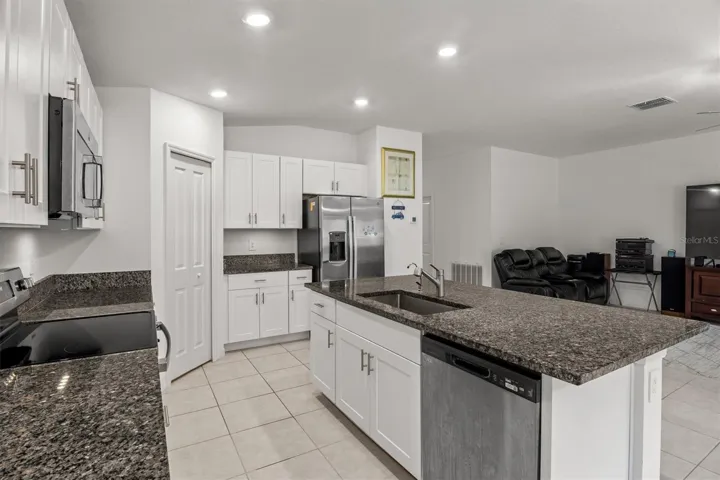 Kitchen features lots of cabinet space and counter space