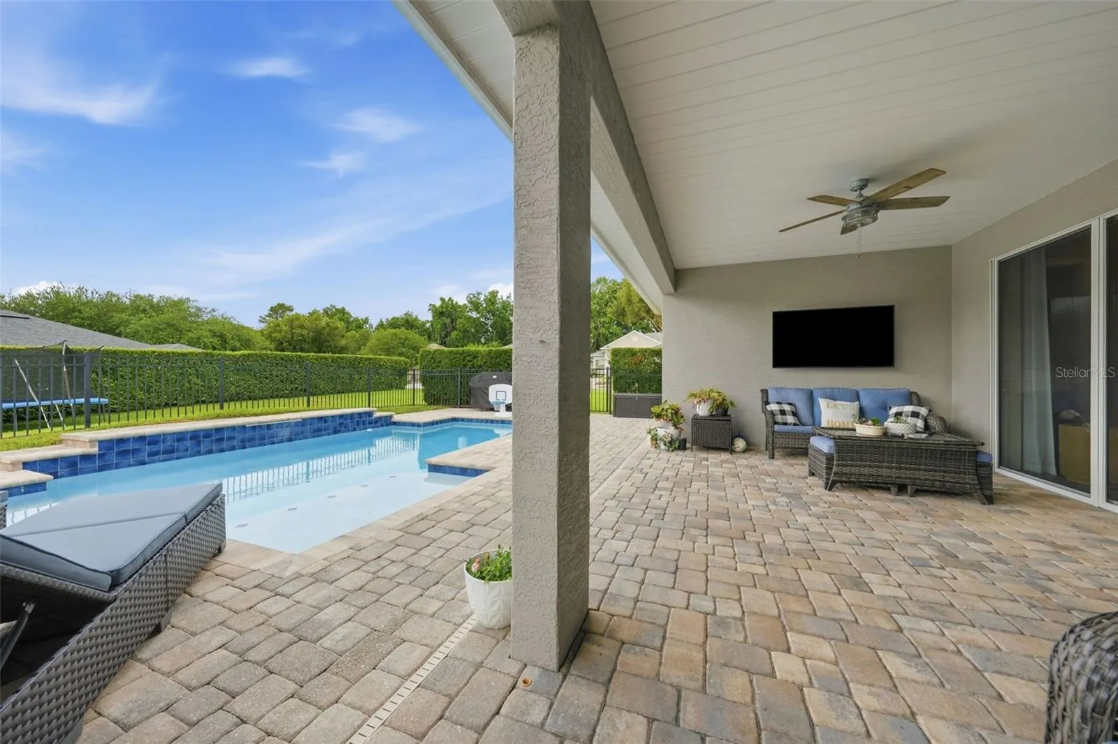 Covered outdoor living area perfect for year round enjoyment