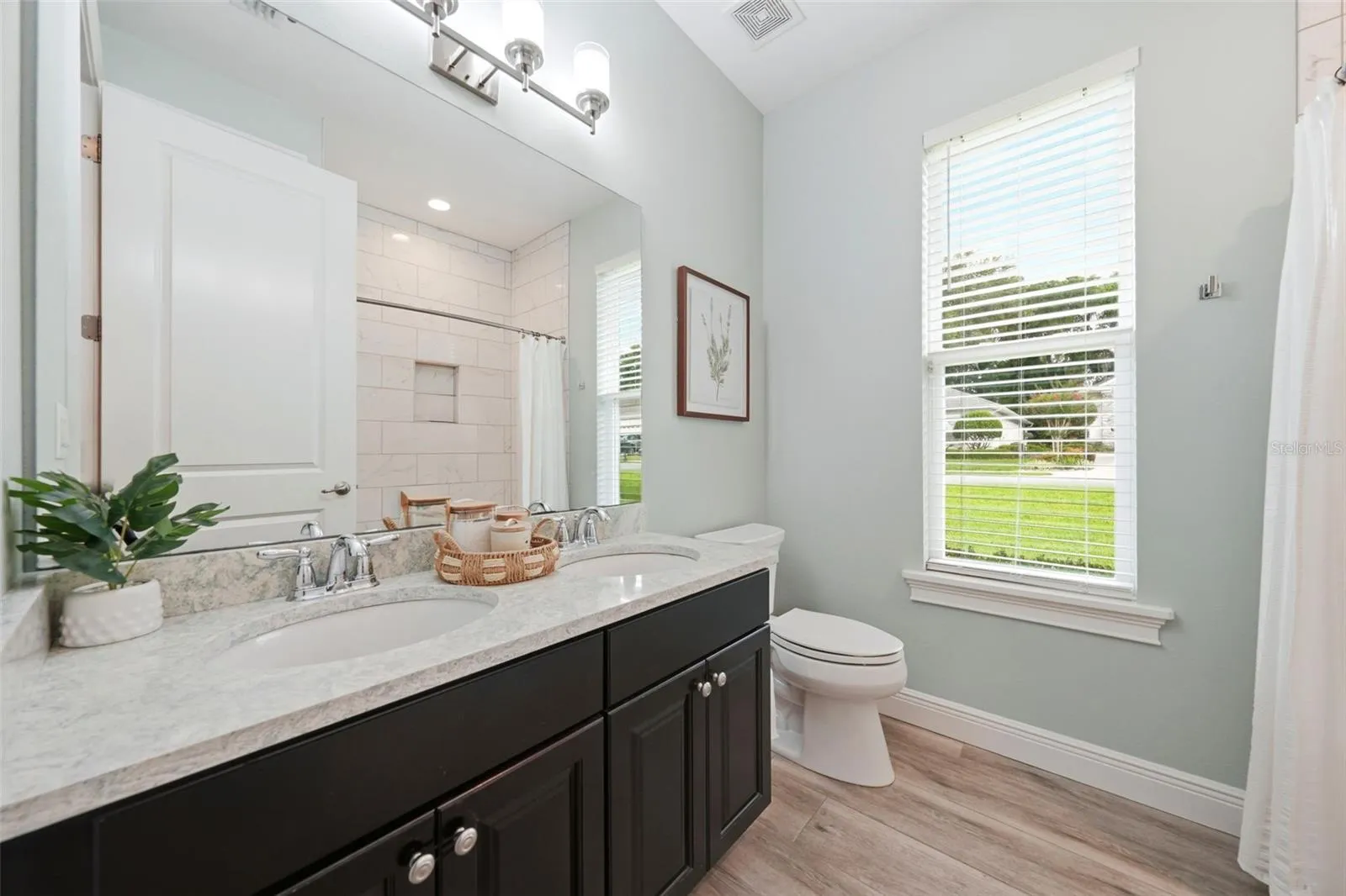 Well-appointed guest bathroom with quality finishes throughout