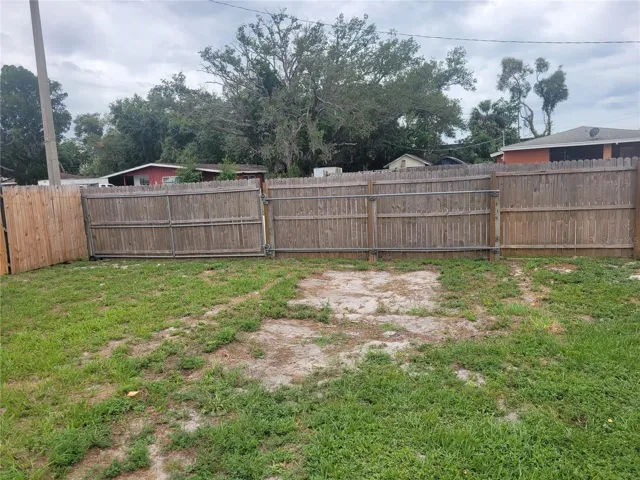 Extra-wide gates to access the backyard and covered parking.