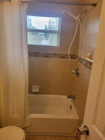 Hall bath offers a tub shower.
