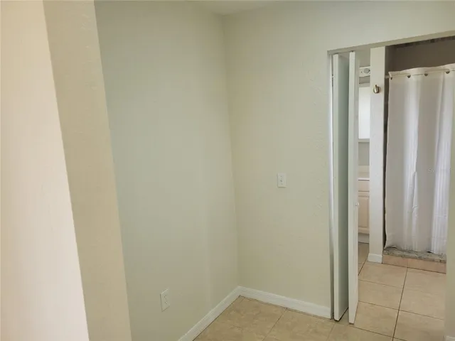 A walk-through Closet separates the primary bedroom from the primary bathroom.