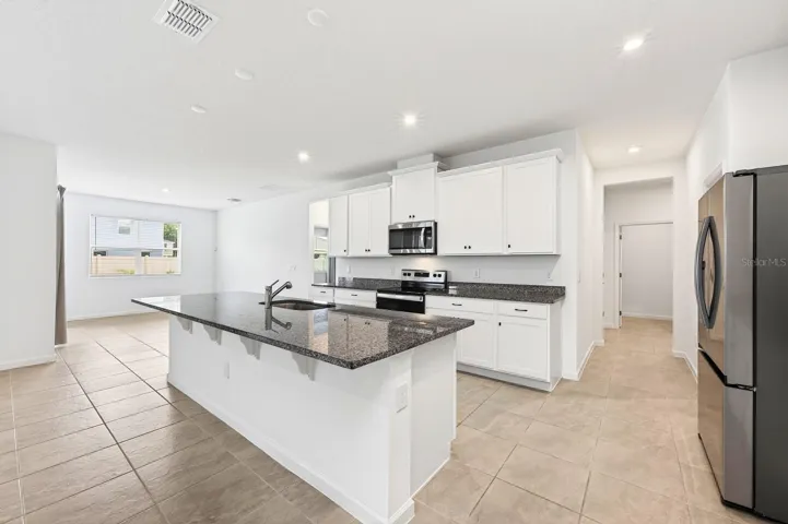 The modern kitchen serves as the heart of the home.