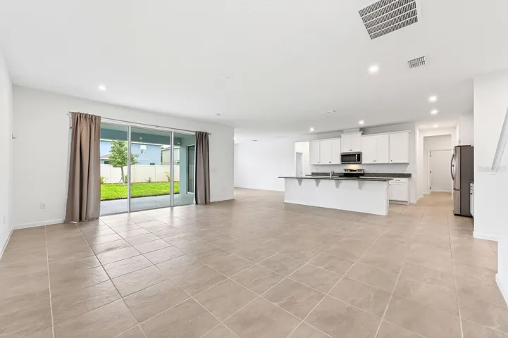 Light, bright open concept living, dining and kitchen.