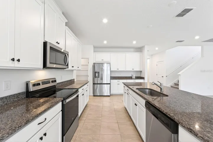 Ample cabinet and counter space.