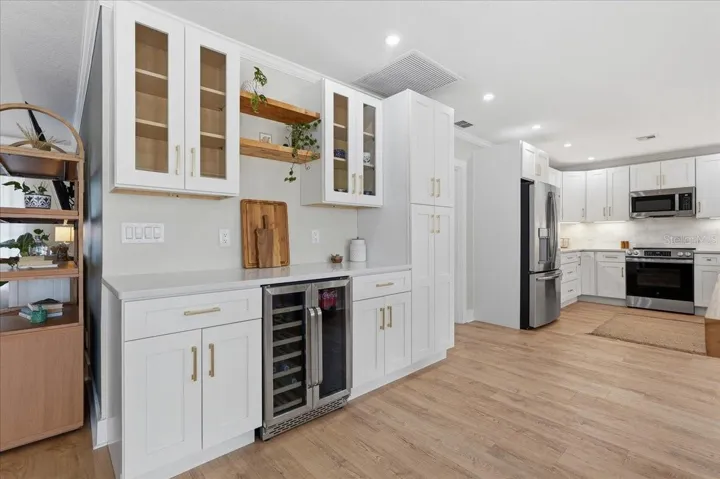 SEPARATE BAR AREA WITH WINE FRIDGE