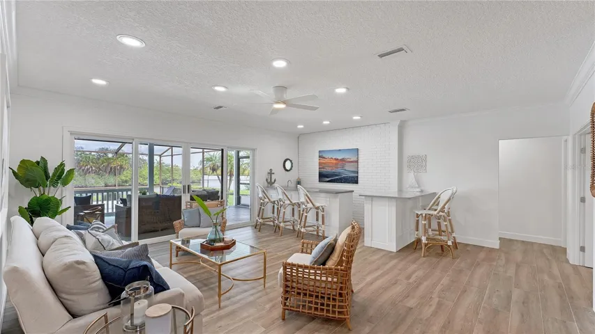 Sunken family room with wet bar and porthole window