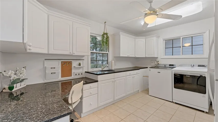 Laundry room on first floor with bonus space