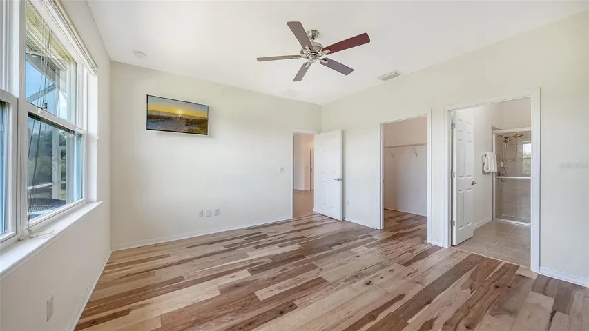 Primary bedroom with large walk in closet