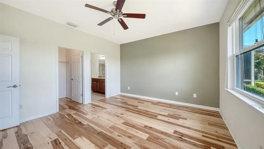 Engineered hardwood floors in all bedrooms