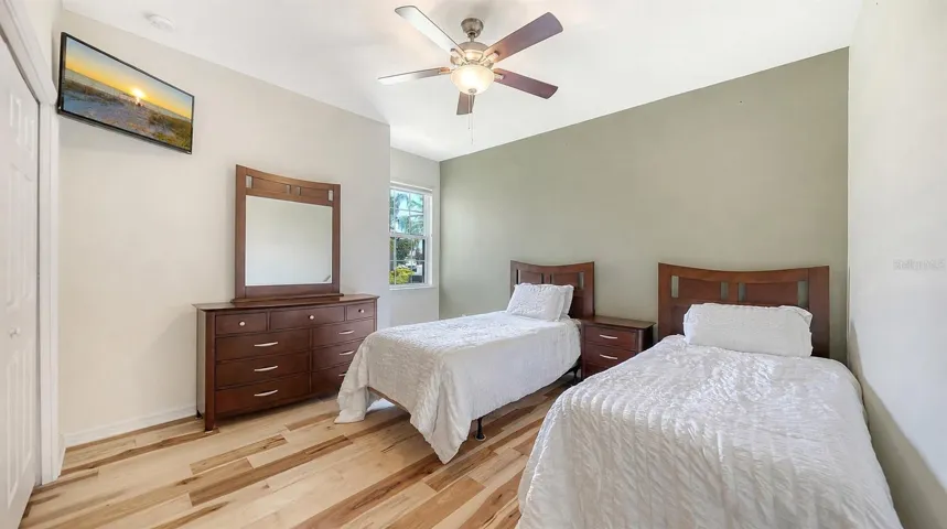 Guest bedroom set up with two twin beds
