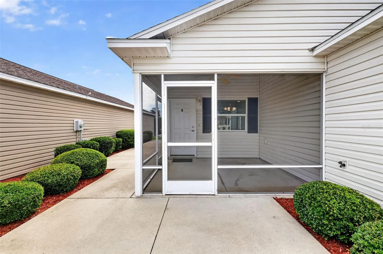 Front Elevation with Lanai and Spacious Rear and Side Patios