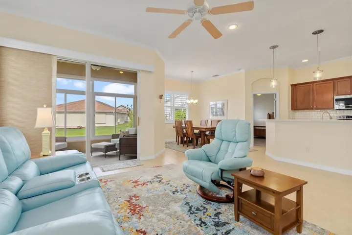 Flow of living area to sunroom-porch expands your living space!