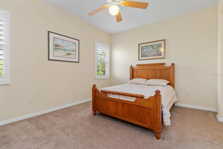 Primary bedroom currently has a queen bed.  There is plenty of space for a King bed and nightstand.