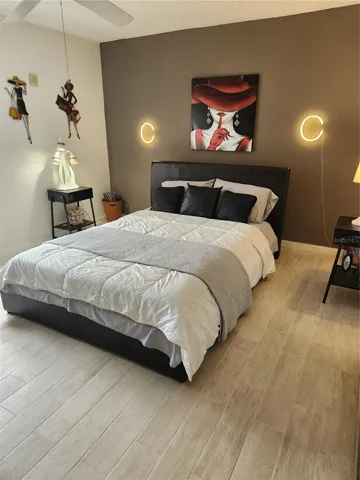 Spacious bedroom with new tile floors