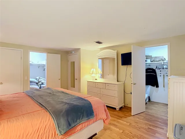 primary bedroom with 2 walk in closets and en suite bathroom!
