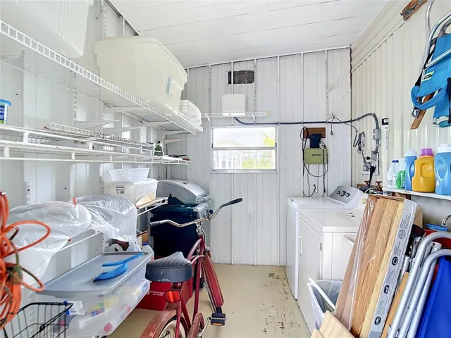 storage/laundry room off the carport