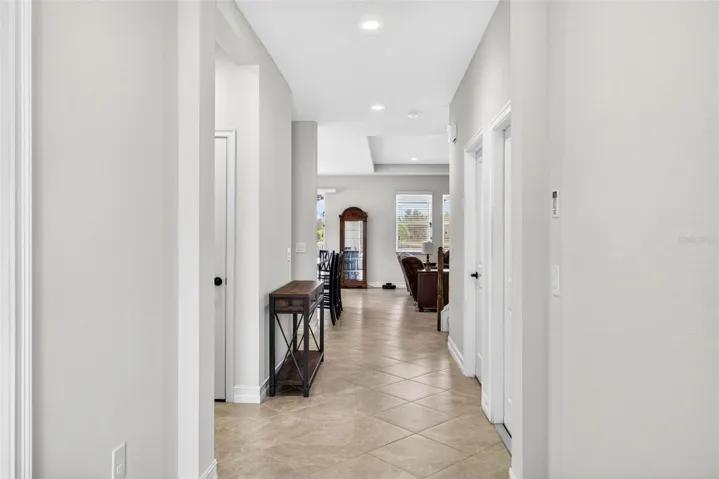 Bright and open entryway with high ceilings.