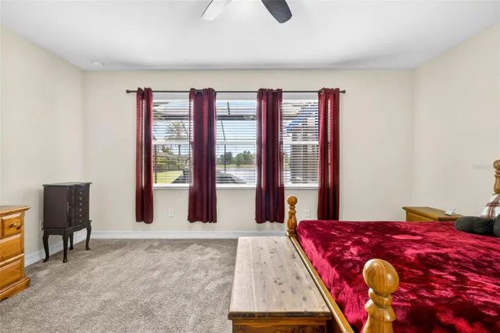 Views of the pool and pond from your primary suite