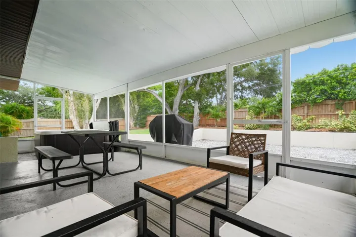 Screened Patio overlooking expansive rear yard