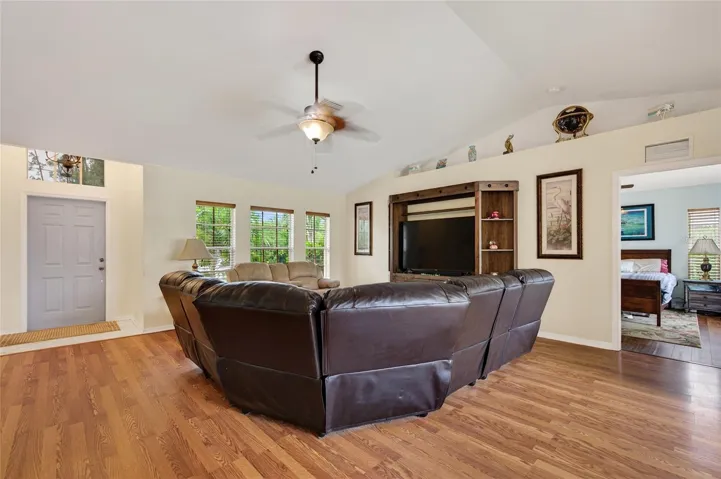 living room with lanai access and lots of natural light