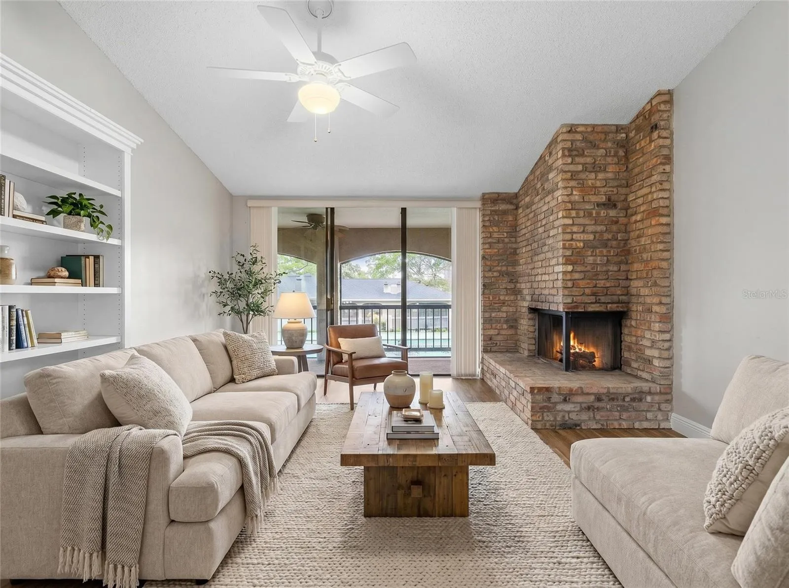 Living room has been virtually stage.This room provides a great space for entertaining and enjoying a warm fire.