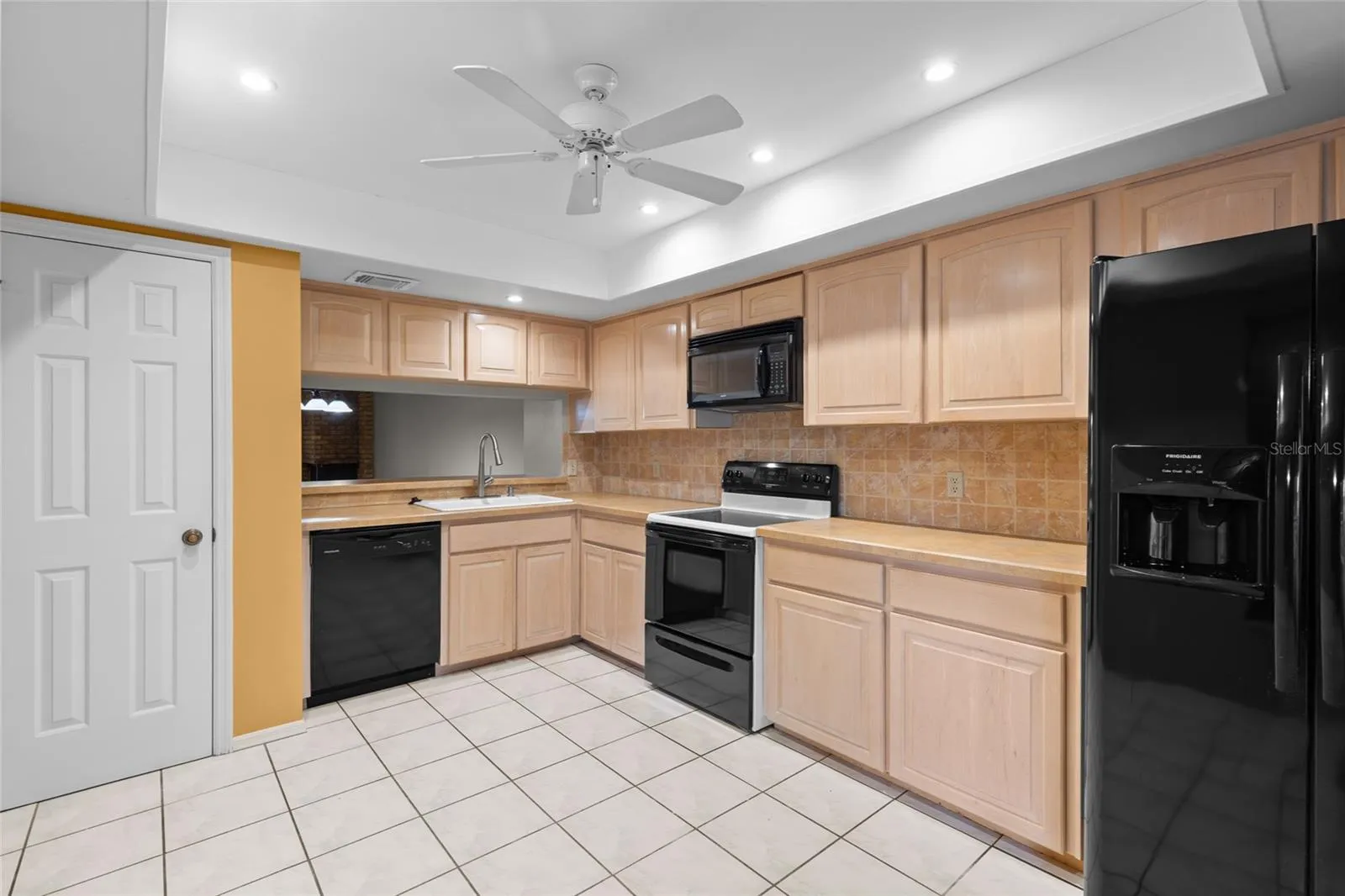 Kitchen has a closet pantry.