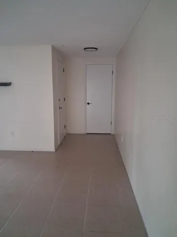 Guest closet behind the front door