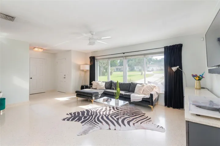 Custom poured terrazzo flooring (including base boards) flow throughout the home. Ready to compliment your decor no matter the style or color palette.