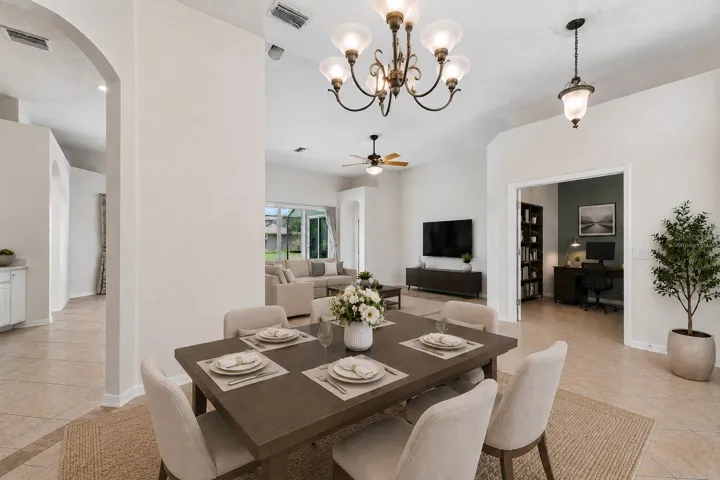 Formal dining room into living room virtually staged