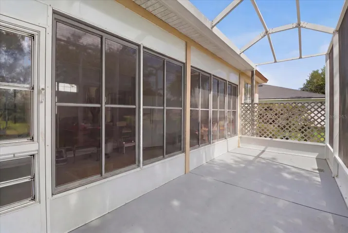 Screened Lanai off the Enclosed Sunroom