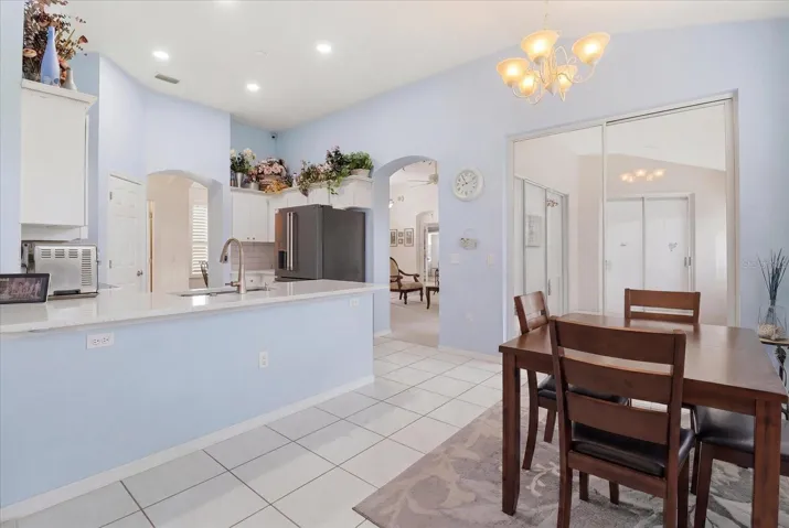 Breakfast Nook w/ Slider to the Enclosed Sunroom