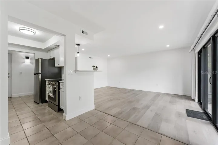 Love the way the kitchen opens to the dining and living area