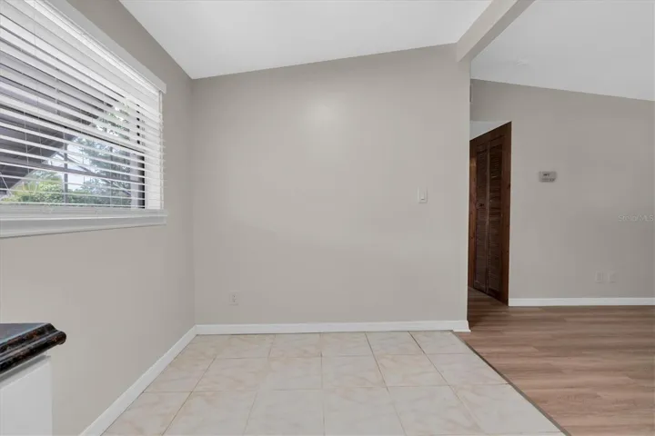The eating space separates the kitchen &amp; living areas