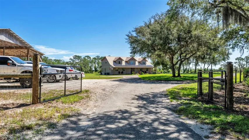 Entry Gate into Fenced Area with Home