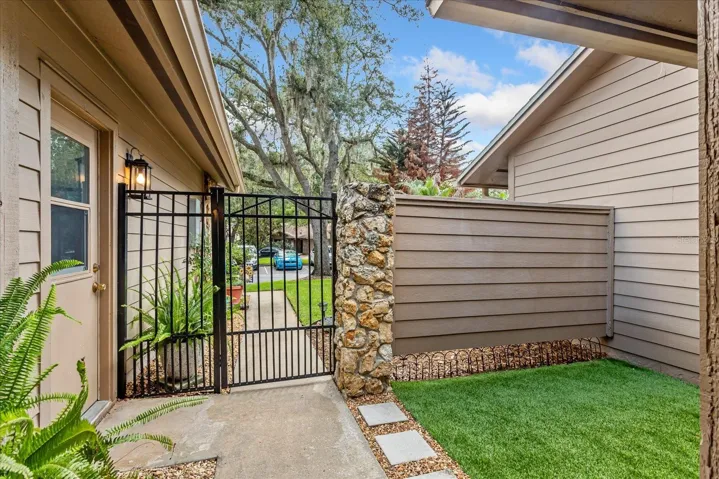 With updated wrought iron gate