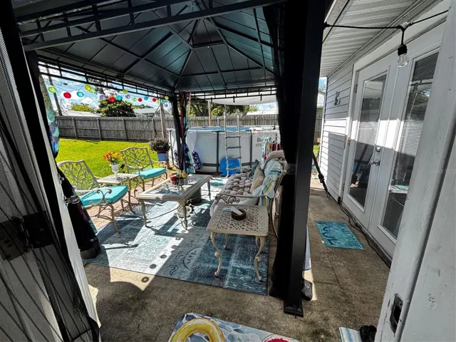 Covered lanai & pool great for relaxing & entertaining!