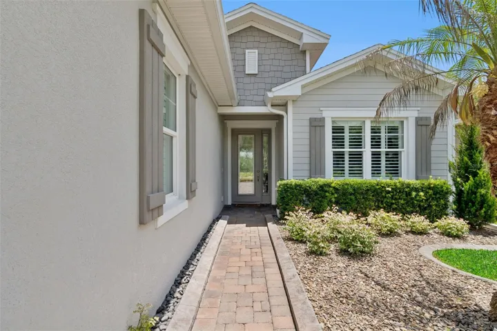 Front walkway w/ concrete landscape bordering